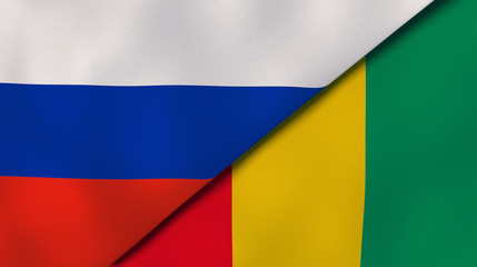 Obraz premium The flags of Russia and Guinea. News, reportage, business background. 3d illustration