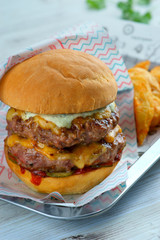 double cheeseburger with melted cheese and blue cheese