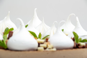 white marshmallows on a cake close-up