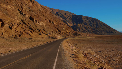 Scenery road through the amazing landscape of Death Valley National Park California - USA 2017