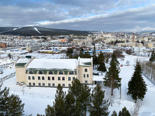 Fototapeta na wymiar Zlatoust city in winter in cloudy day, Chelyabinsk region, southern Ural
