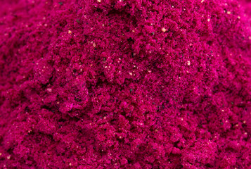 Obraz premium Background of Bright Pink Dragonfruit Powder