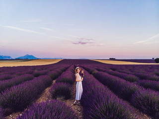 Resting woman enjoying on lavender fields at France