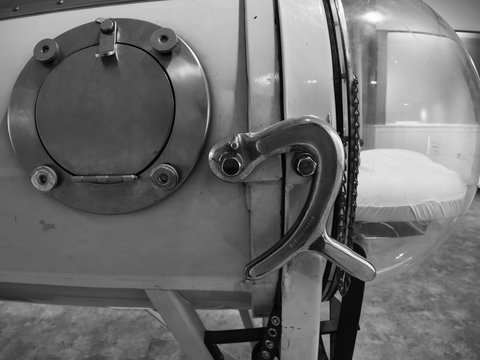 Black and white up close photo if a iron lung