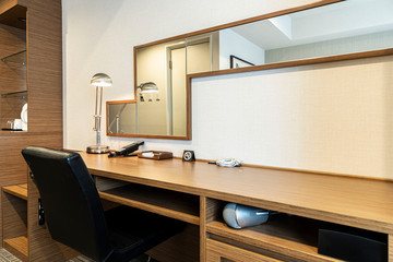 Work desk and large mirror in the room
