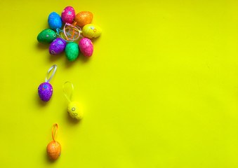 Colorfull eggs on color background symbolize joy and hippieness of great Easter Holiday.