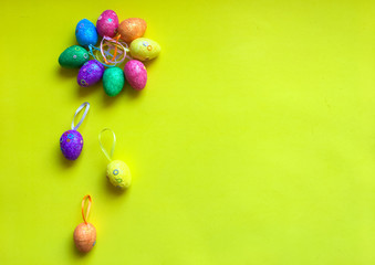 Colorfull eggs on color background symbolize joy and hippieness of great Easter Holiday.