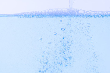 Light blue bubbles and water White background