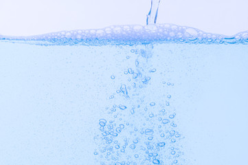 Light blue bubbles and water White background