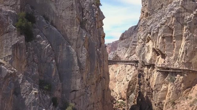 Drone view of - The King's Little Path Way - "El Caminito del Rey" in El Chorro gorge , one of the most dangerous footpaths, a famous touristic destination in south of Spain, Malaga , Costa del Sol