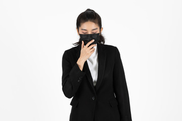 Portrait young Asian business woman in suit wearing face mask on white isolated background. Coronavirus flu virus , Covid 19 , Air pollution pm2.5 concept.