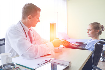 Obraz premium Professional doctor interview or talking with woman patient in hospital room or clinic, healthcare measure blood pressure diagnosis disease concept