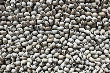 A wall of teapots. Ceramic walls.