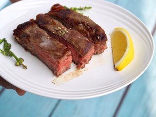 Juicy Beef  chops steak decorate with lemon