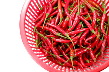 red chille in red basket