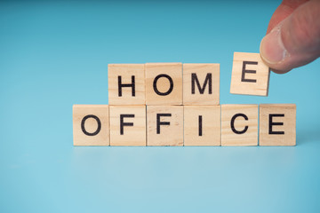 Home Office infection concept. Letter of wooden blocks