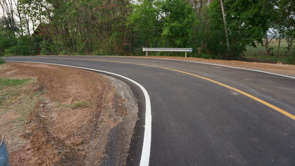 Asphalt road and countryside views