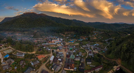 panorama of the city and sunset in the mountains including twilight sky - 337921468