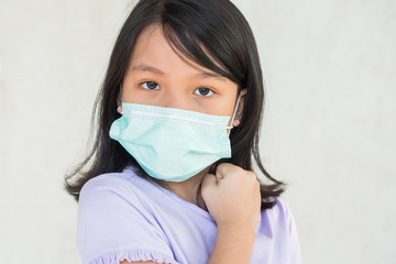 coronavirus asian woman wearing flu virus mask prevention. asian little girl wearing protective face mask for plague coronavirus. show stop hands gesture for stop virus outbreak epidemic symptoms.