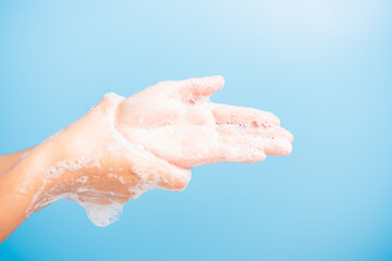 woman washing hands with soap have foam