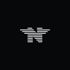 Minimal elegant monogram art logo. Outstanding professional trendy awesome artistic N initial based Alphabet icon logo. Premium Business logo White color on black background