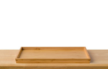 Empty sushi bamboo tray board on wood table white background. Bamboo products that have been processed into trays for use in the kitchen. Top view of plank wood for graphic stand design product.