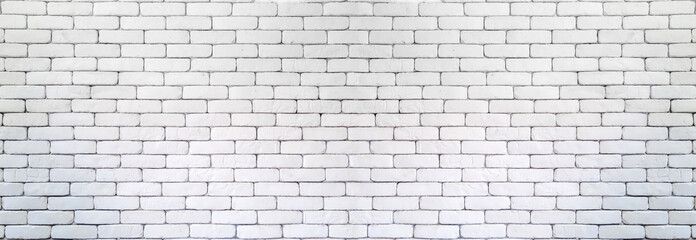 Panoramic white brick wall texture for background.