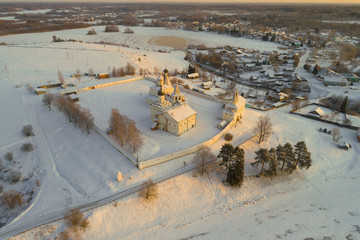 Old Ferapontov Belozerskiy Bogoroditse-Rozhdestvenskiy Monastery in the winter landscape on a December evening (aerial photography). Vologda Oblast, Russia
