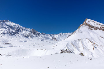 Fototapeta na wymiar Beautiful Landscape with snow covered mountains along Sipti river in Himalayas.