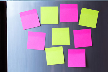 Abstract of Blank paper and stick paper on refrigerator door. paper note with magnet