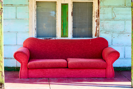 Red Sofa Against House