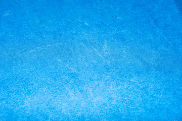 Abstract blurred background in blue with water stains and fine texture. Substrate for website, brochure, cover or flyer layout.