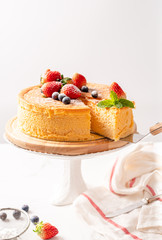 Happy birthday fresh fruit cheese cake with Happy birthday on cake concept with strawberry kiwi fruit cake. Food concept.
