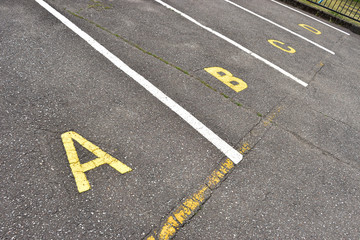 Image of Alphabet-waved parking lot