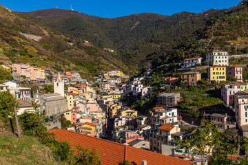 Fototapeta na wymiar Cinque Terre coast and small towns with vibrant colorful houses in La Spezia, Italy