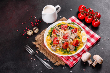 Spaghetti with mushrooms, cheese, spinach, rukkola and cherry tomatoes