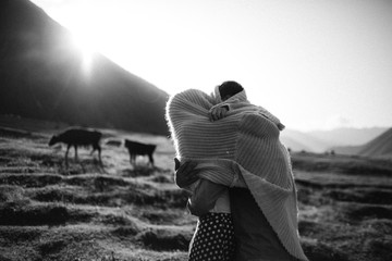 Loving couple on their engagement photoshhot in mountains