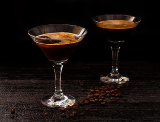 alcohol coctail glass on a black background. horizontal banner for designers
