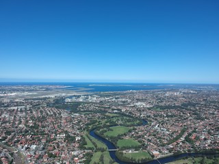 Drone panoramic aerial view of Sydney NSW Australia city Skyline and looking down on all suburbs 