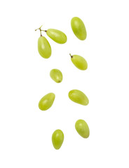 Falling green grapes isolated on white background with clipping path.