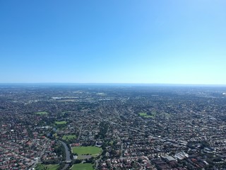 Drone panoramic aerial view of Sydney NSW Australia city Skyline and looking down on all suburbs 