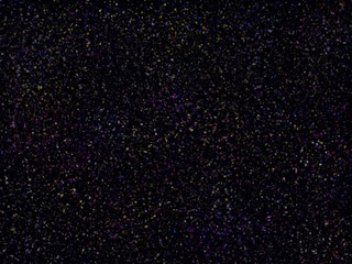 Fond noir remplit de petits points de couleur