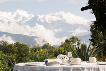 Luxury Breakfast table overlooking the Himalaya Annapurna mountain at sunrise, Pokhara, Nepal