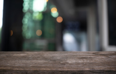 Wood Table Top in Blur Background room interior with empty copy space.