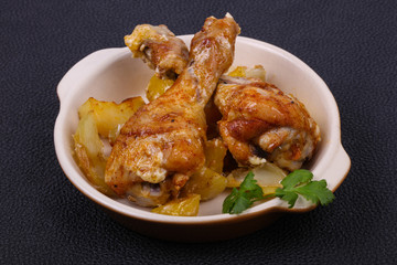 Roasted chicken legs with potato