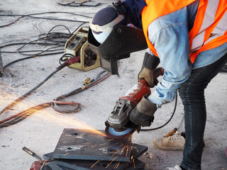 Fototapeta premium Welding work ,worker with protective welding metal on construction