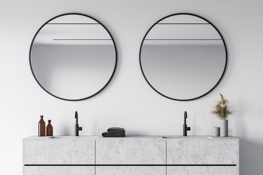 Close Up Of Double Sink In White Bathroom