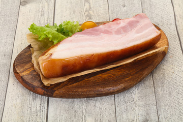 Smoked pork breast with salad leaves