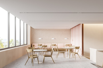 Beige cafe interior with window and sofa