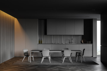 Gray and wooden kitchen, countertops and table